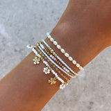 Eloura™ White Bracelet with Gold Flower