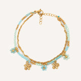 Eloura™ White Bracelet with Gold Flower